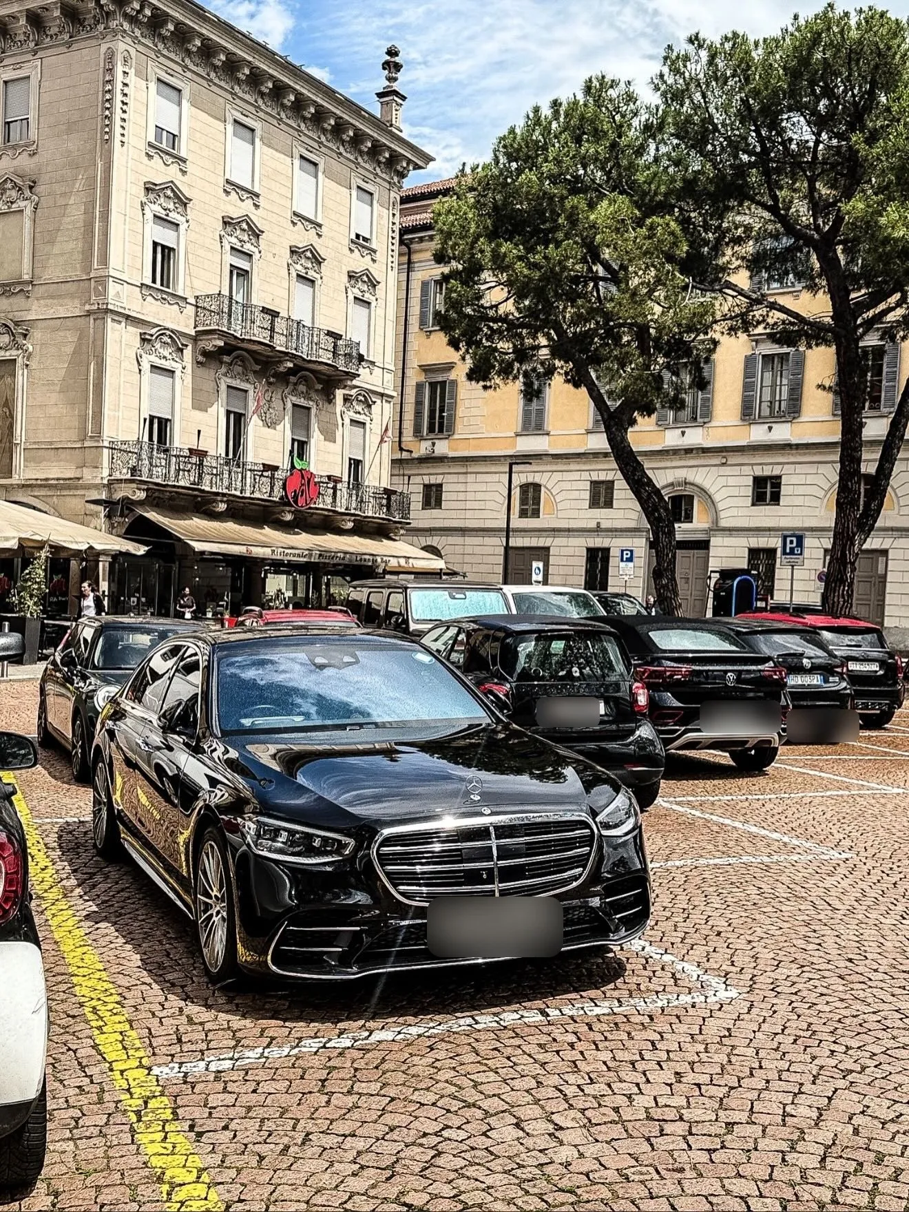Mercedes S-Class parked by the lake promenade in Lugano, Switzerland